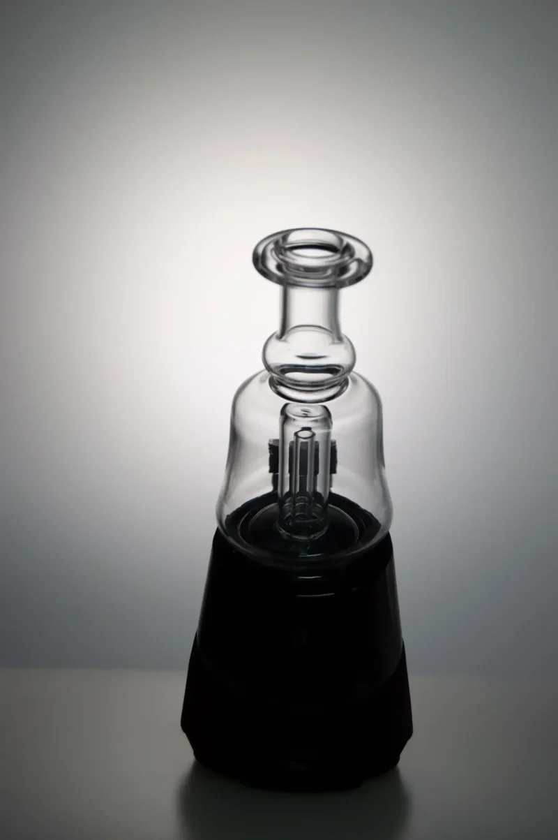 Puffco Peak Pro glass attachment with Wiidz SOC installed, positioned facing south, showcasing its sleek design and functionality in use.