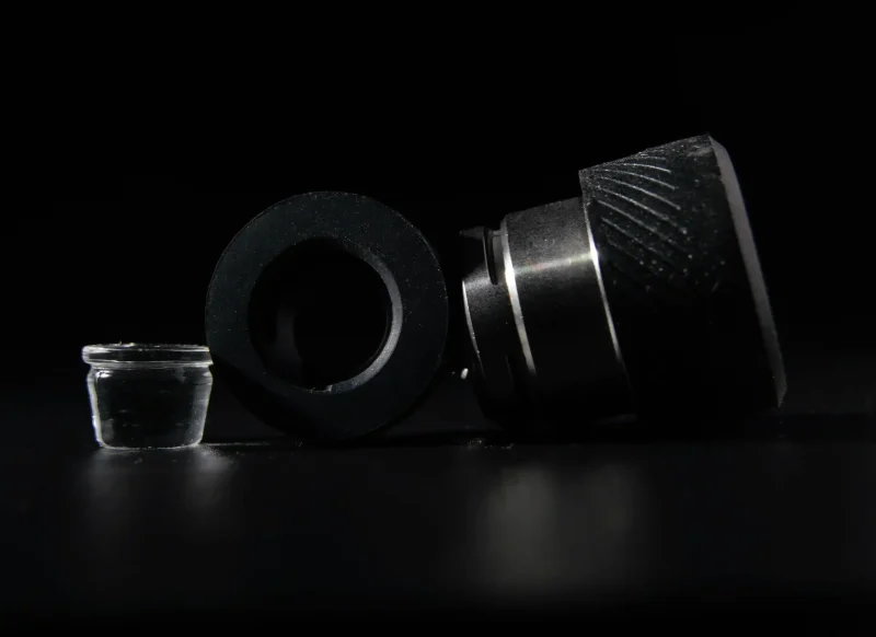 Puffco Peak Atomizer WIIDZ 3D Chamber featuring a separate ring, displayed horizontally, showcasing its upscale design and innovative features in a high-quality image.