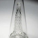 Close-up view of the Puffco Peak Glass Wiidz Original 2.0 featuring a clear center, showcasing exquisite craftsmanship and design details.