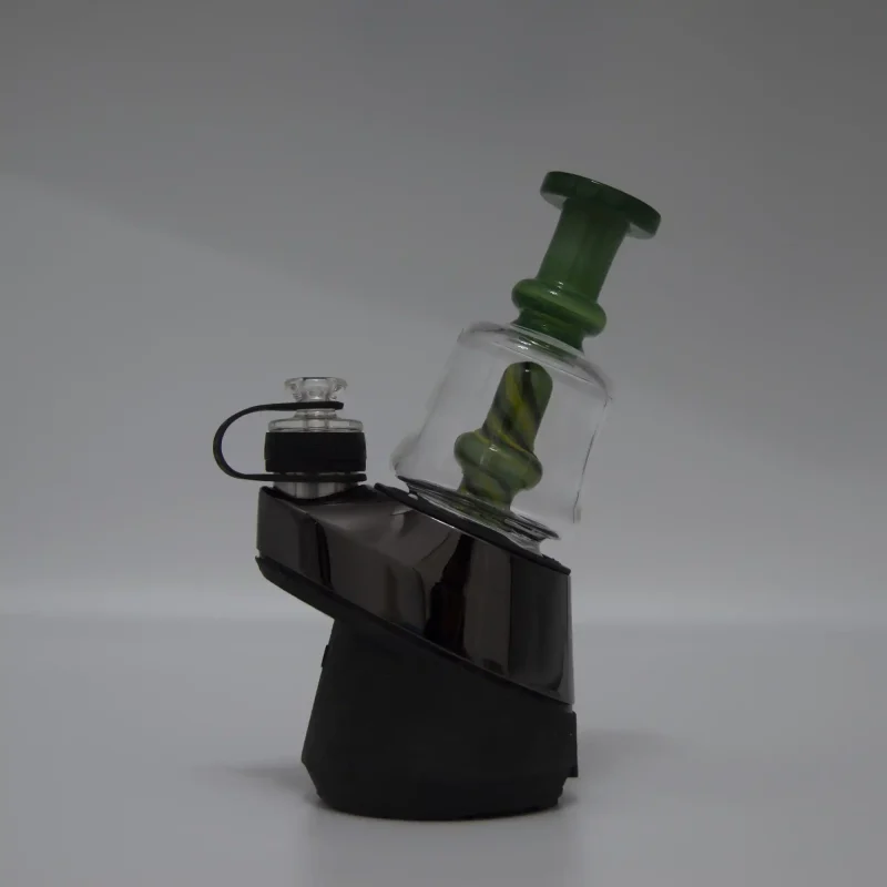 Puffco Peak Pro glass attachment WIIDZ Pico in vibrant green, expertly installed and oriented towards the east, showcasing its sleek design and functionality for enhanced dabbing experiences.