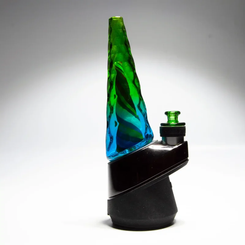 Puffco Peak Pro glass attachment WIIDZ in vibrant rainbow colors installed facing west, showcasing a stylish and functional upgrade for enhanced dabbing experiences.