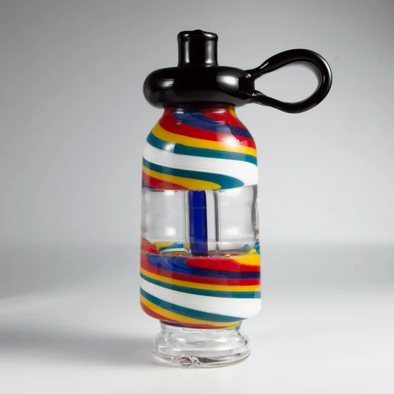 Puffco Peak Pro glass attachment featuring a Wiidz flask, positioned to the west, showcasing a sleek design and functional elegance for optimal vaporization.