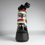 Puffco Peak Pro glass attachment installed on a Wiidz flask, positioned facing north, showcasing a sleek design and functionality perfect for concentrate enthusiasts.