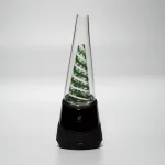 Puffco Peak Pro glass attachment in Wiidz green twist design, expertly installed and oriented to the south, showcasing its unique aesthetic and functionality.