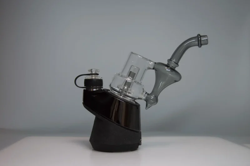 Puffco Peak Pro glass attachment featuring Wiidz Sherlock design in black, installed facing east, showcasing a sleek and modern aesthetic perfect for enhanced dabbing experiences.