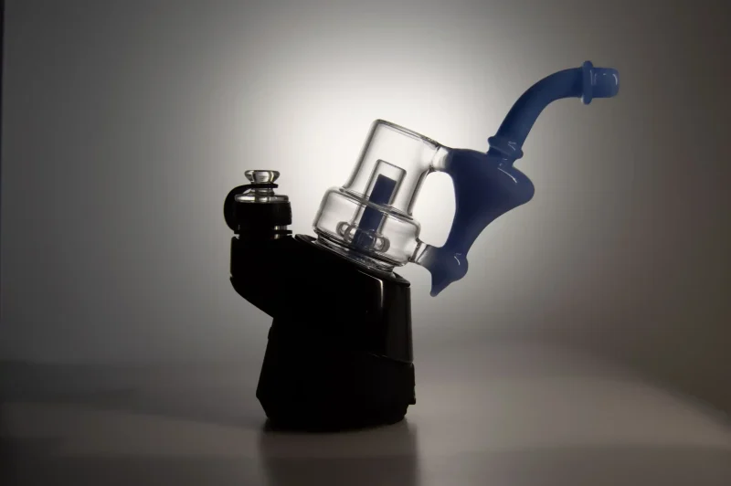 Puffco Peak Pro glass attachment in Wiidz Sherlock Blue, installed facing east, showcasing a stylish and functional design for enhanced vaping experience.