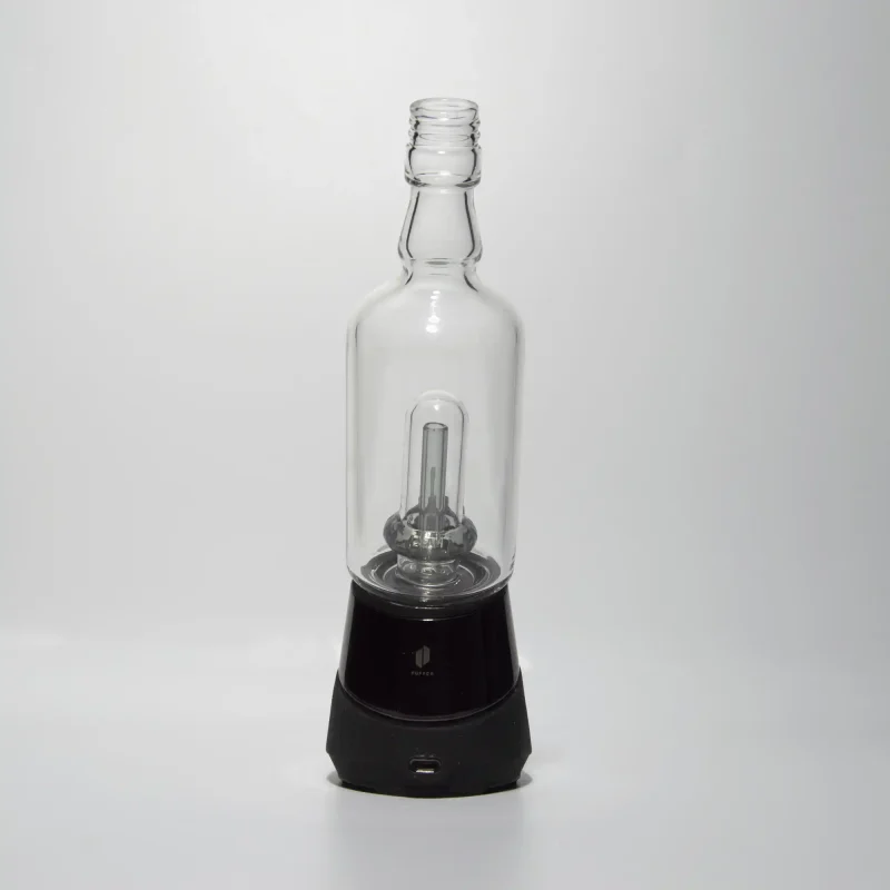 Puffco Peak Pro glass attachment with Wiidz Tipsy in black installed facing south, set against a clean white background, showcasing its sleek design and functionality.