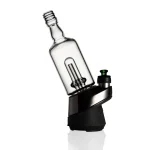 Puffco Peak Pro glass attachment in Wiidz Tipsy Black color installed, oriented towards the west, with a shadow effect creating a striking visual contrast.