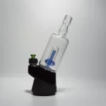 Puffco Peak Pro glass attachment in Wiidz Tipsy Blue color installed, facing east against a clean white background, showcasing its sleek design and functionality for enhanced vaping experience.
