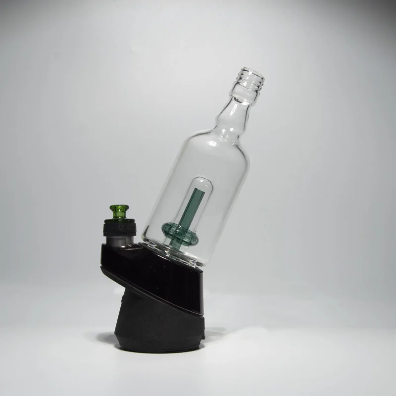 Puffco Peak Pro glass attachment with Wiidz Tipsy Green installed, oriented east, on a white background.