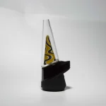 Puffco Peak Pro glass attachment in Wiidz yellow color installed facing west, showcasing its unique design and functionality for enhanced vaping experience.