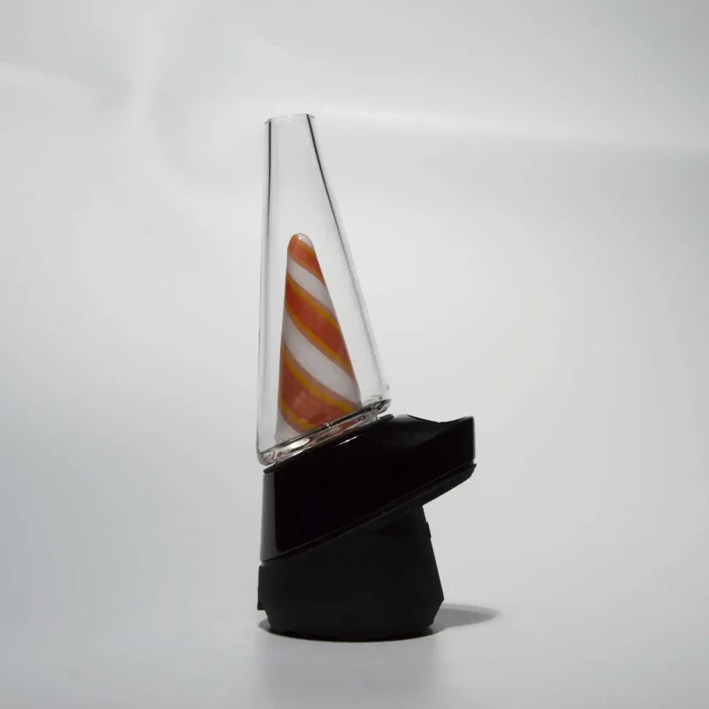 Puffco Peak Pro glass attachment named Wiidz Orange Twist, installed facing west, showcasing a vibrant orange design that enhances the aesthetic and functionality of the vaporizer.